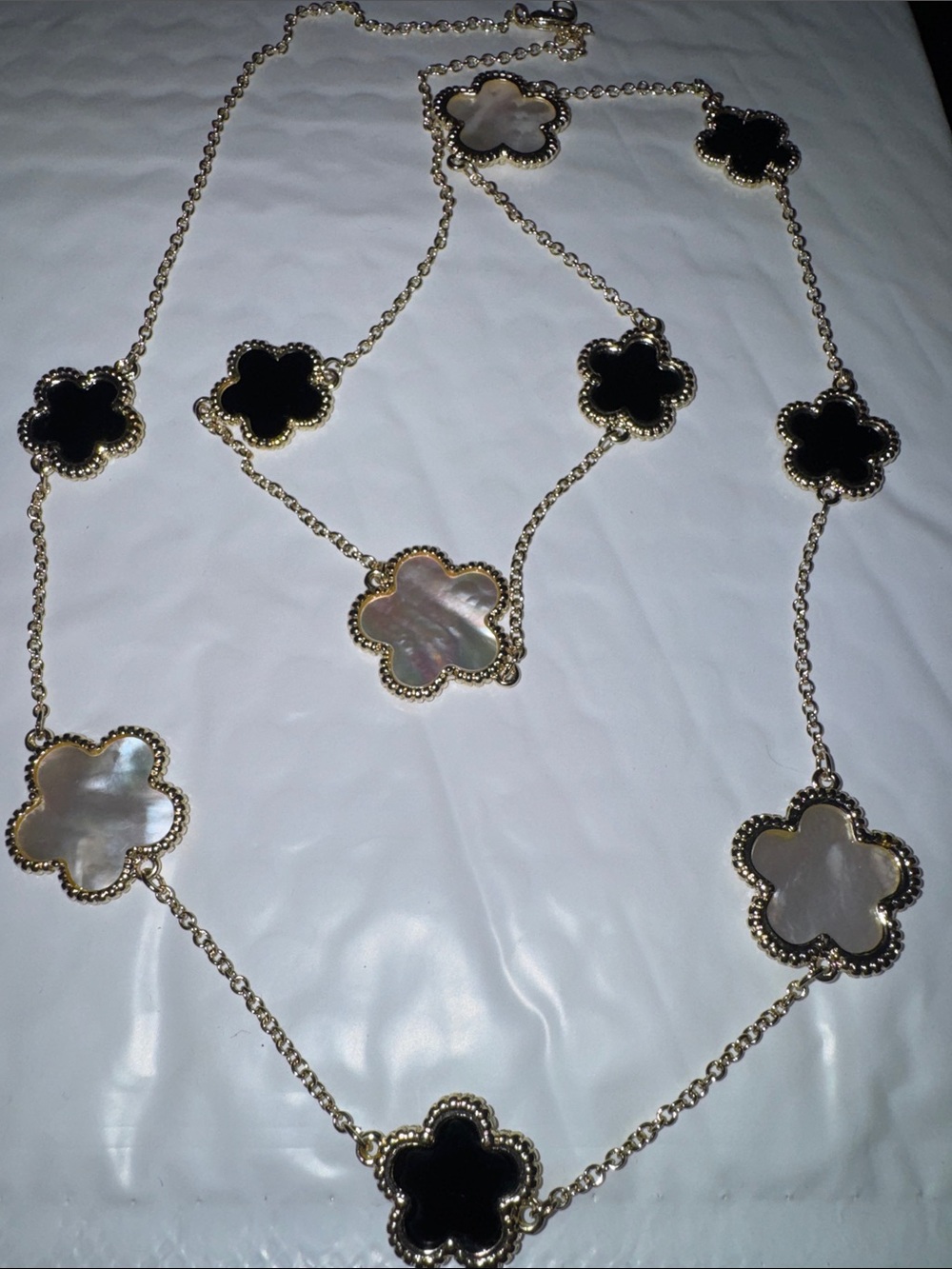 Gold-Trim Clover Station Necklace with Black and Mother-of-Pearl Motifs